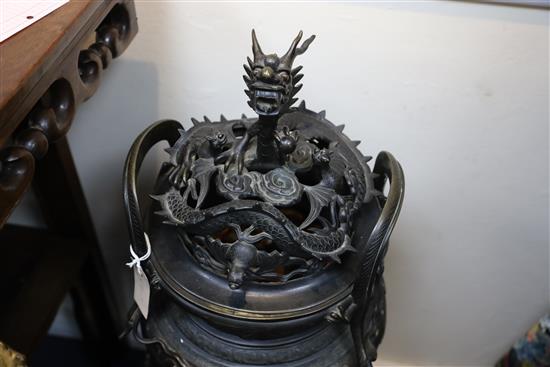 A rare Chinese archaistic bronze censer and cover, Xuande fifteen character mark but 19th century, H. 62.5cm